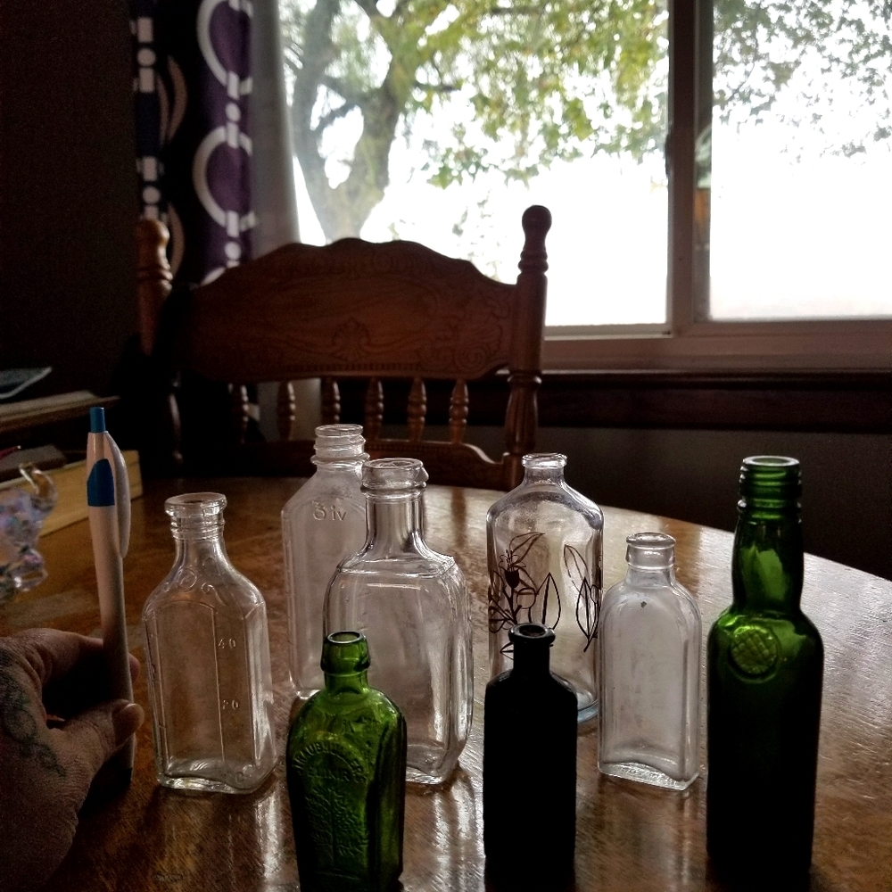 Mini antique glass bottles